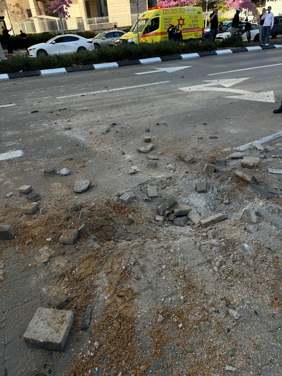 Five people are wounded at two locations in central Israel following Iran's latest ballistic missile attack, medics say.
Intercepted missile fragments or sub-munitions from cluster bomb warheads hit several locations. The IDF says it is investigating the impact sites.
Magen David Adom says it treated a woman in her 40s in moderate condition who was injured by a blast, and four others in good condition after they were hit by glass shards and blasts.