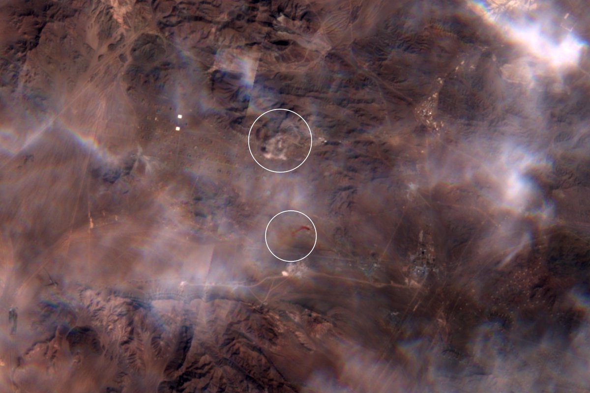 Recent Sentinel-2 satellite imagery shows airstrikes approximately 30 kilometers north of Qom, Iran, with an orange cloud on the ground indicating missile strikes.
