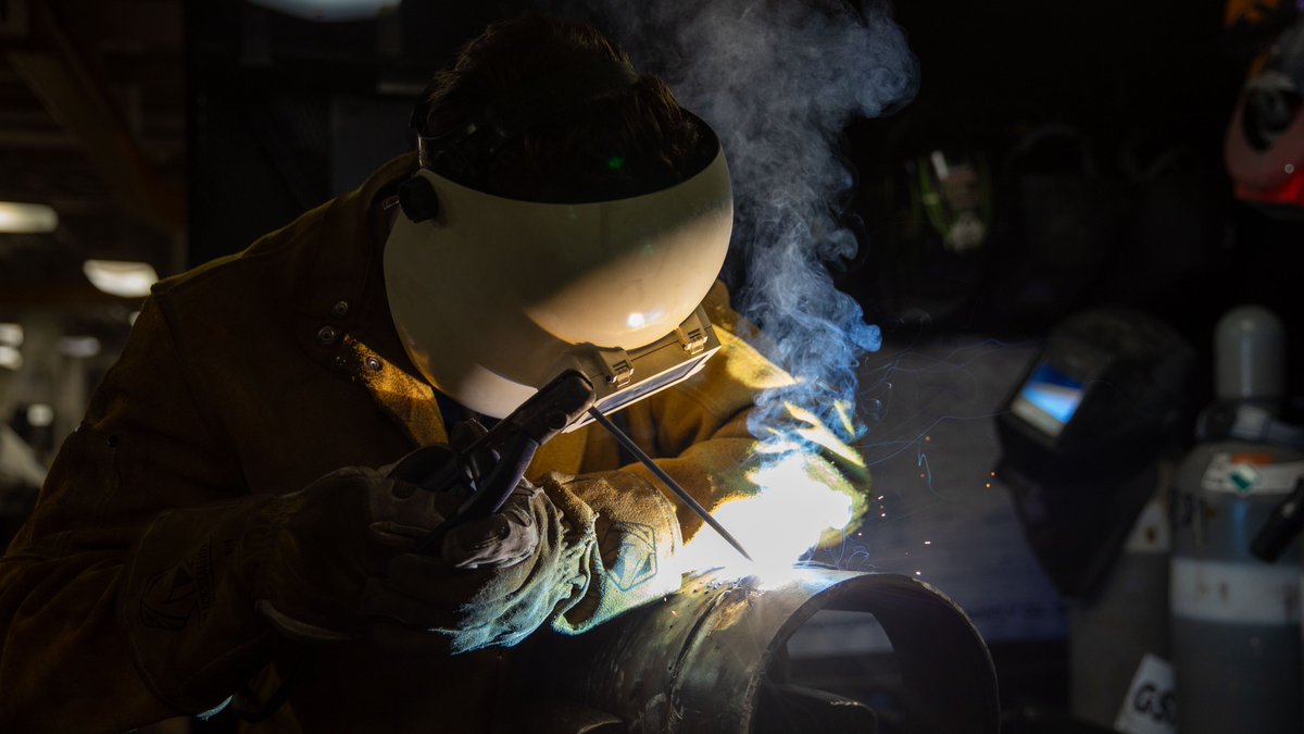 Below the hustle and bustle of a U.S. aircraft carrier flight deck, thousands of Sailors put in countless hours to keep the ship running 24/7.