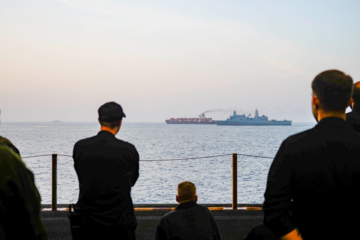 U.S. forces patrol the Arabian Sea near M/V Touska, April 20, as the Iranian-flagged vessel's container cargo is searched after U.S. Marines boarded and seized the ship when it attempted to violate the U.S. naval blockade.