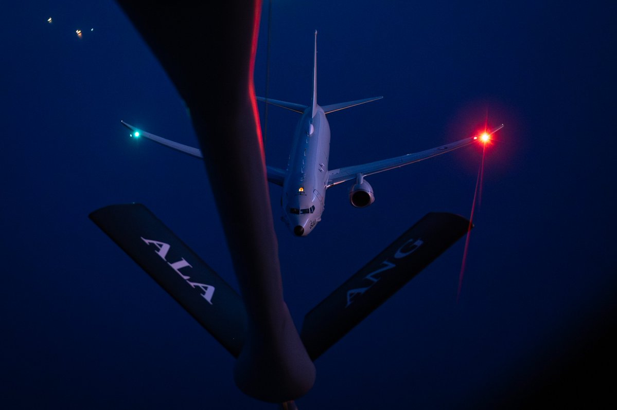 A U.S. Air Force KC-135 Stratotanker refuels a U.S. Navy P-8 Poseidon during the U.S. blockade against ships entering or exiting Iranian ports. The P-8 can provide surveillance for extended periods, scanning vast waterways from high altitude.