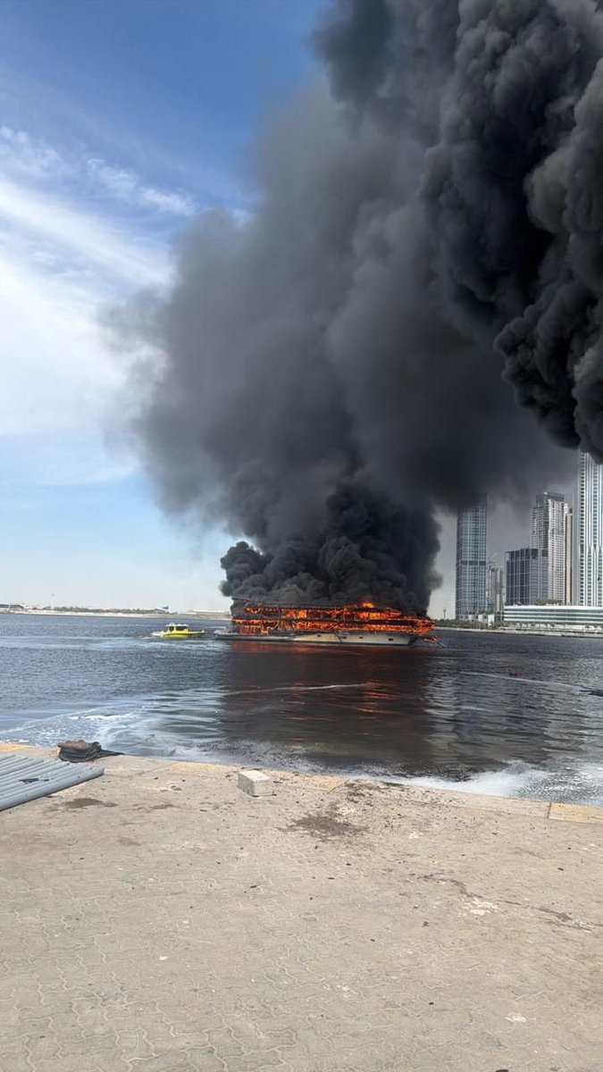 The Dubai Media Office confirmed that smoke seen in the Jaddaf area was from a fire on a stationary boat in Dubai Creek, with no injuries and smoke due to fiberglass material.