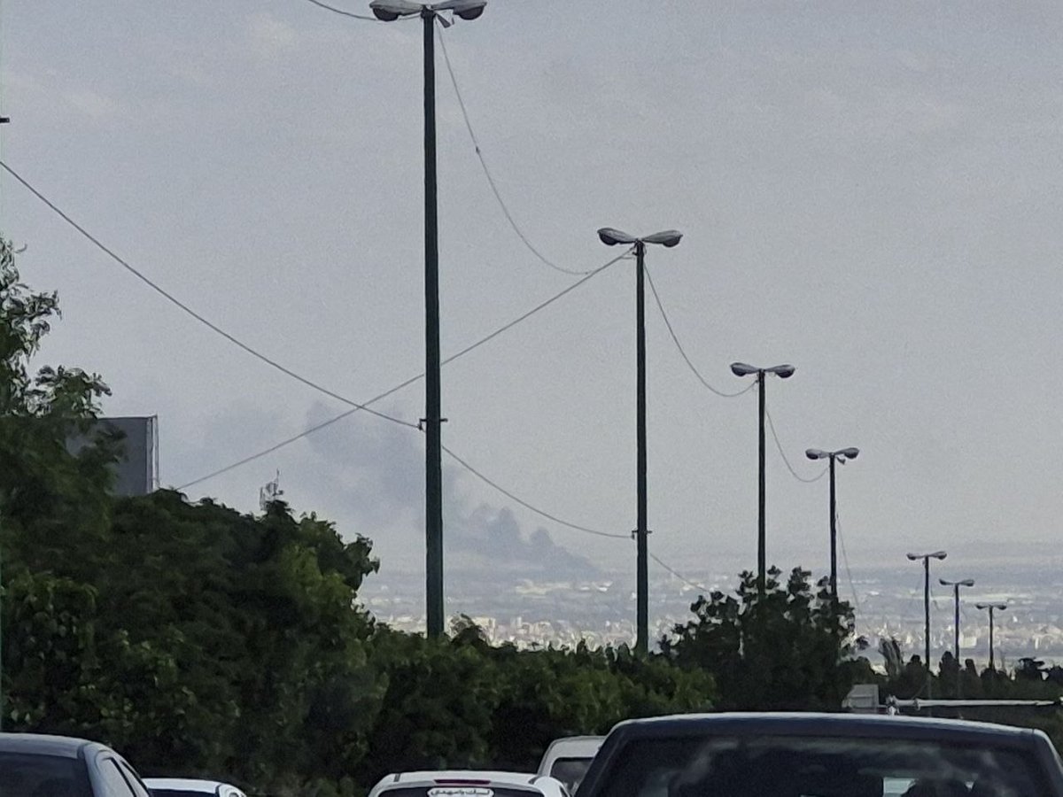 Smoke observed rising from southern Tehran, seen from Yadegar Highway facing south.