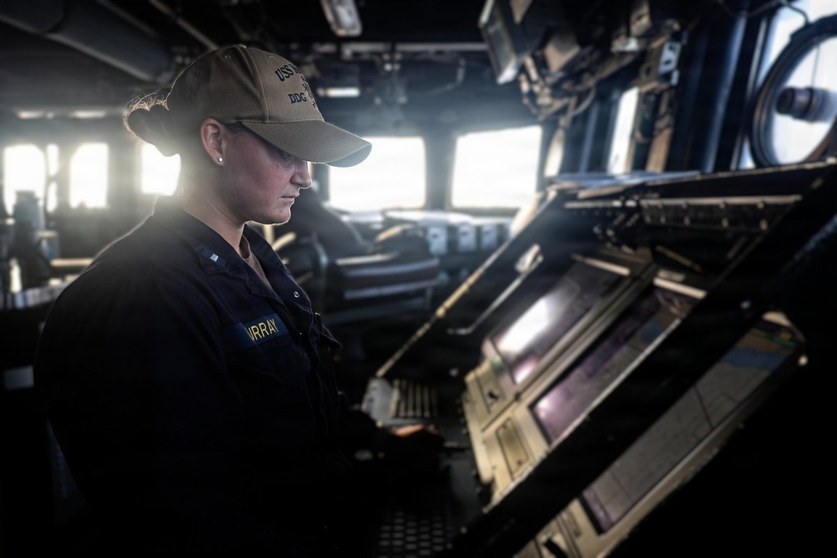 A U.S. Sailor stands watch aboard USS McFaul (DDG 74) while the ship continues to support the U.S. blockade against Iran. As of June 4, U.S. forces have redirected 127 commercial vessels, disabled 6 non-compliant ships, and allowed 36 vessels supporting humanitarian aid to pass.
