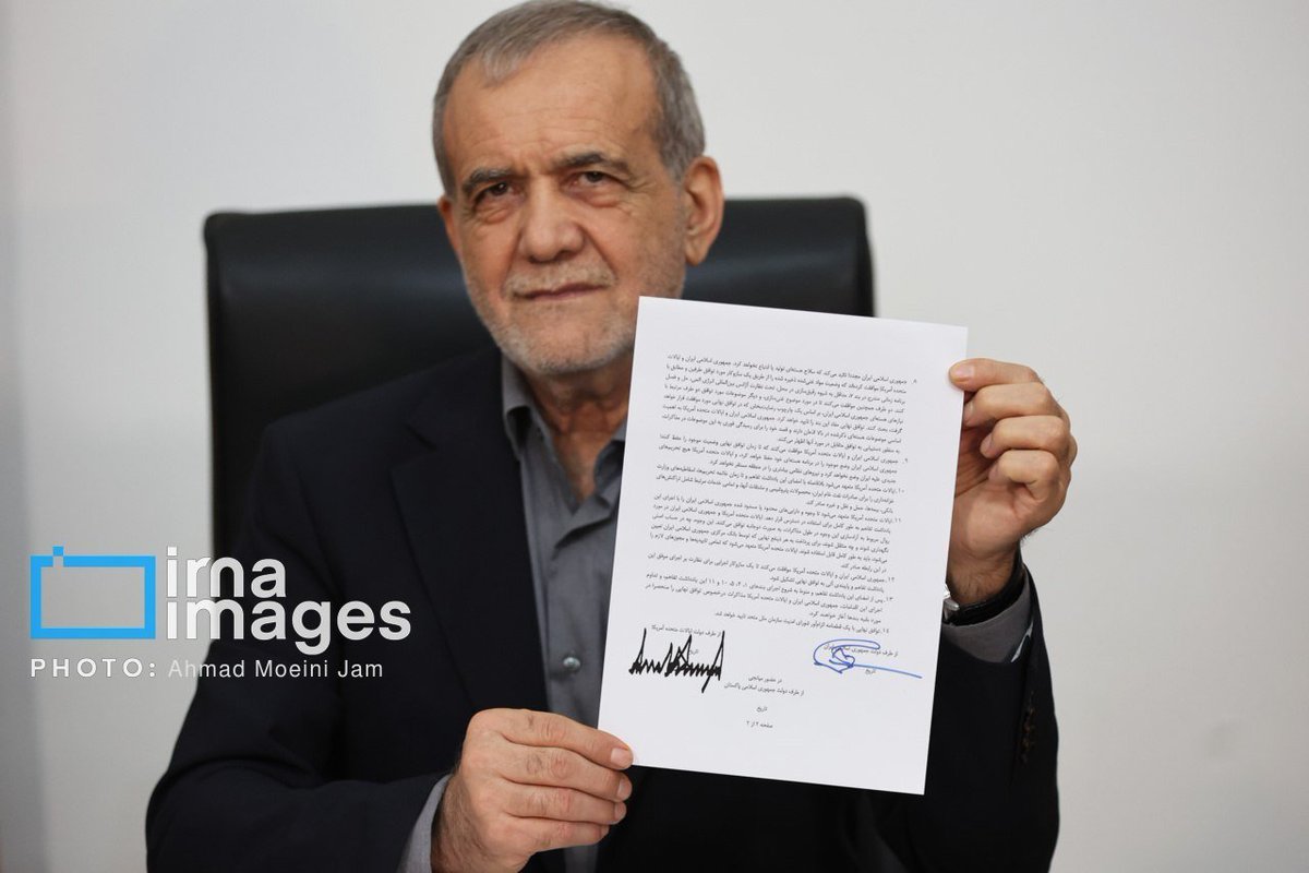 Iranian President Masoud Pezeshkian displayed a Memorandum of Understanding signed by himself and U.S. President Donald Trump.