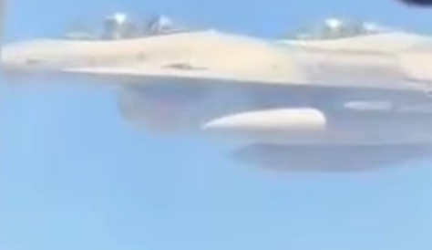 A humorous observation on a photo of a PAF F-16 escorting an Iranian plane, where the wingman is momentarily mistaken for a WSO.