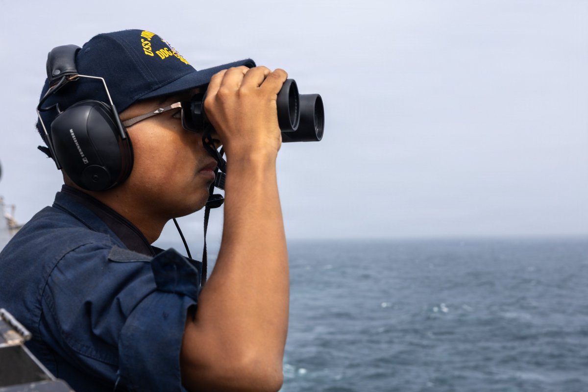 A U.S. Sailor stands watch aboard USS John Paul Jones (DDG 53) as the guided-missile destroyer continues to support the U.S. blockade against Iran in regional waters. As of Sept. 3, CENTCOM forces have redirected 87 commercial vessels, disabled 3 and boarded 2 to ensure total